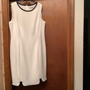Kasper white Dress w/black piping around the neckline &unique hemline never worn